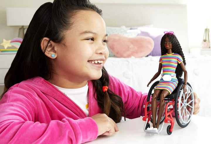 Barbie Fashionistas Doll #166 with Wheelchair & Crimped Brunette Hair - Rainbow Dress, 22 Joints